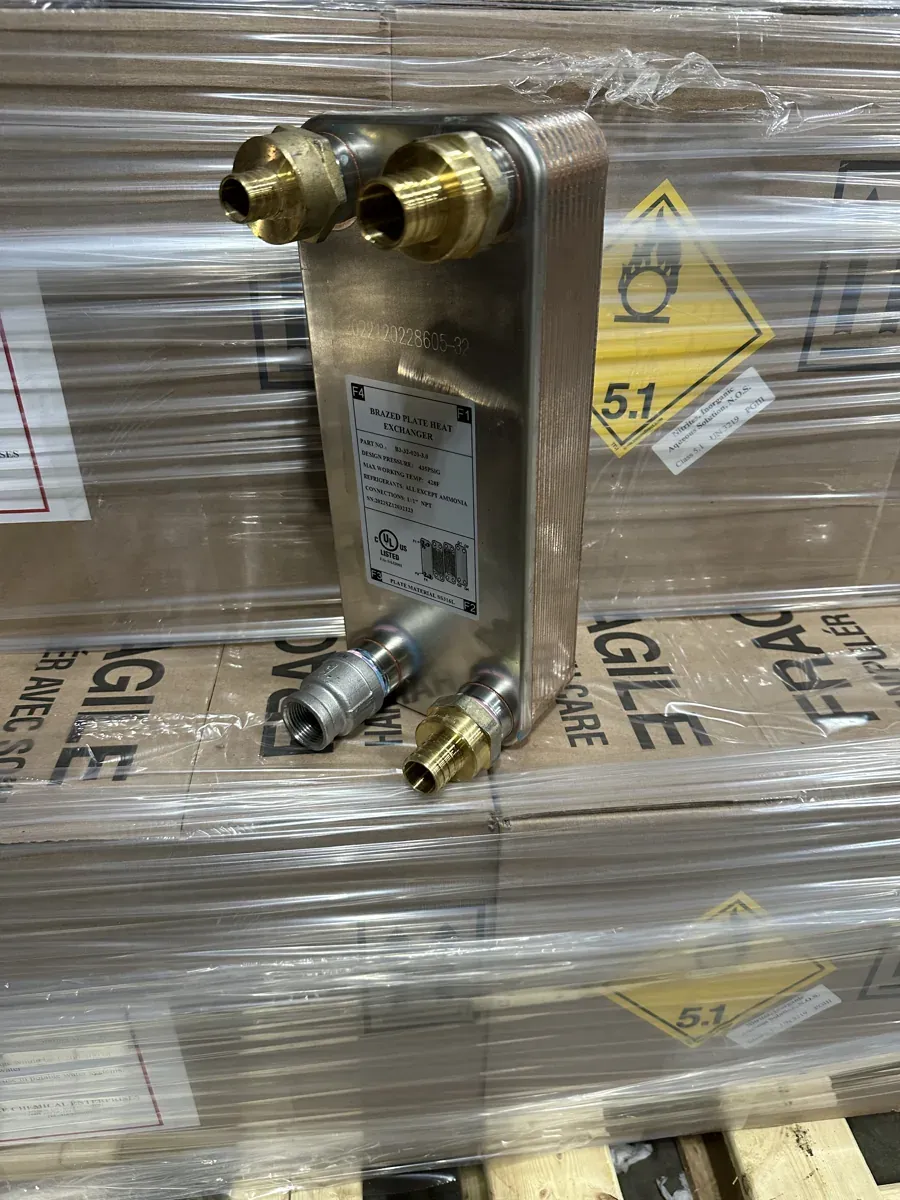 Plate heat exchanger with brass pipe fittings