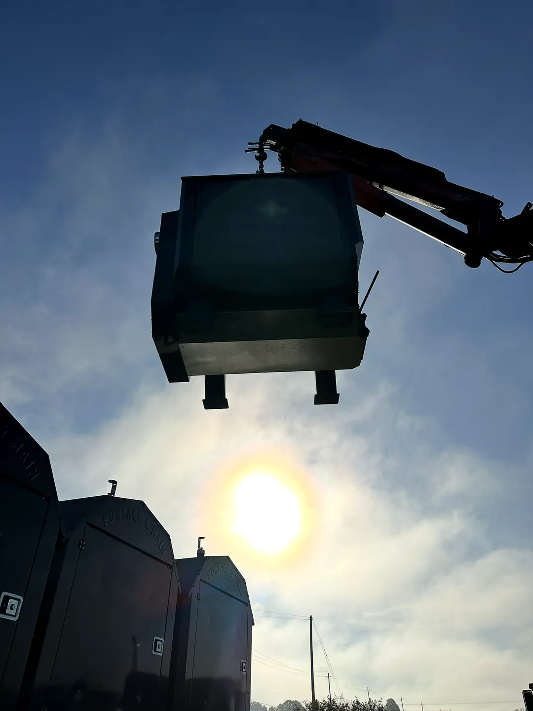 Swinging a boiler down off the truck